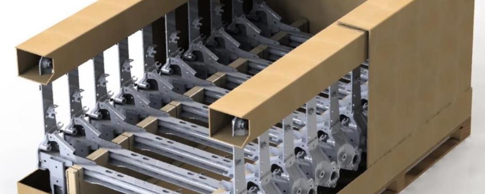 Den nya fiberbaserade förpackningen är tänkt att ersätta metallcontainrar vid transport av chassidelar. Foto: DS Smith Tecnicarton